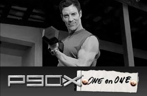beachbody coach tony horton holding a dumbbell as he coaches you 1 on 1 through the p90x workout offered by the top male beachbody coach scottie hobbs